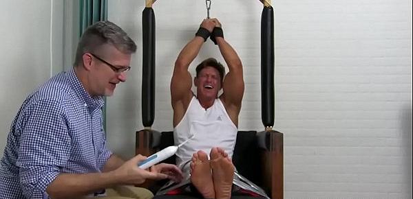  Handsome muscle stud tied up and tickled by horny master
